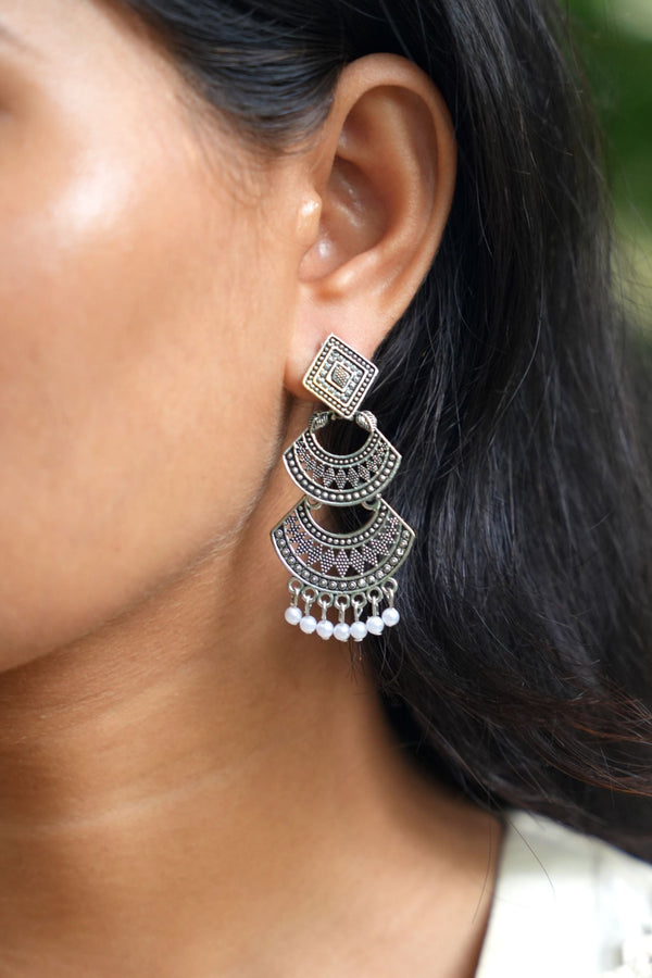 The Duble Dangling Motif Moon Jhumkis.