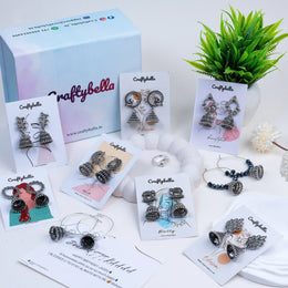 Set of 9 Jhumkas with a hug ring And a Free Personalised card