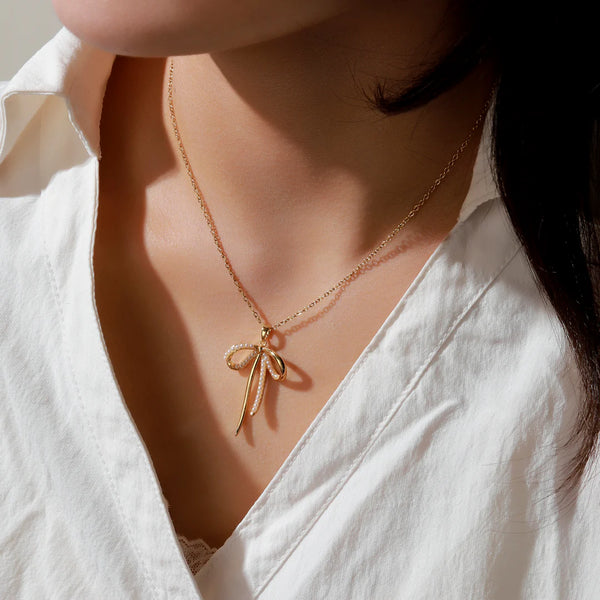 Golden Pearl Bow Pendant Necklace