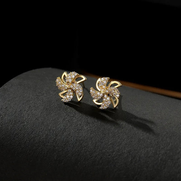 Arzonai Rotating Windmill Earrings golden for Women and Girls